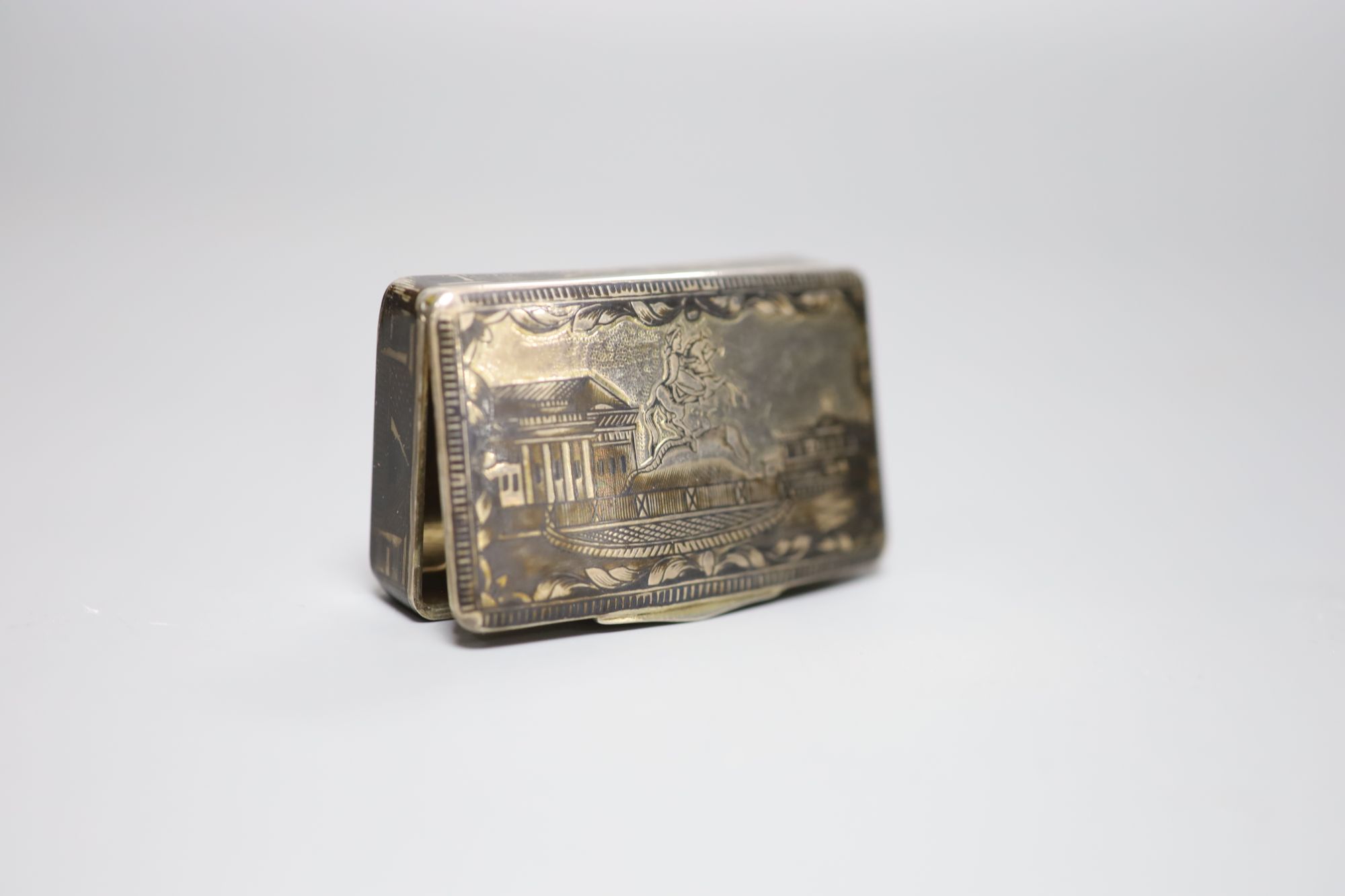 A 19th century Russian 84 zolotnik and niello concave snuff box, dated 1836, 64mm, gross 59 grams,